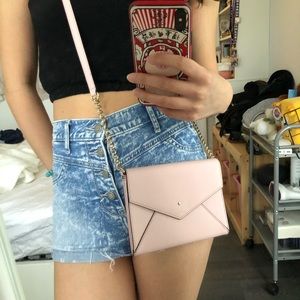Kate Spade pink wallet on chain